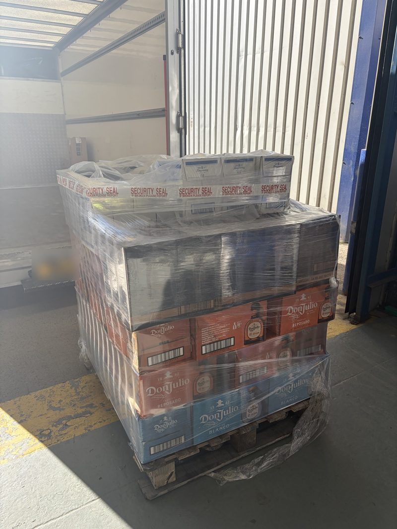 Sealed pallet of premium tequila and gin ready for delivery