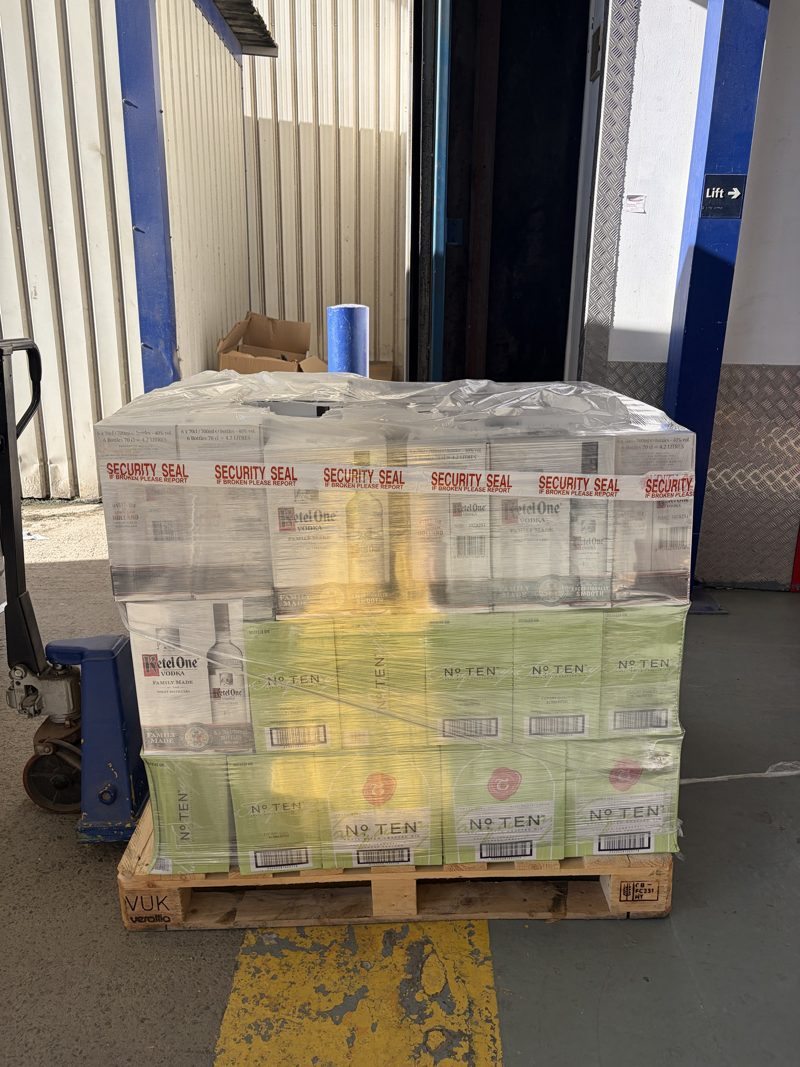 Sealed pallet of vodka and gin ready for delivery